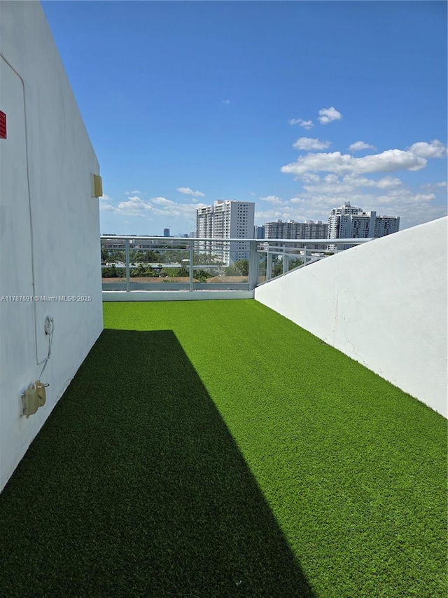 2950 NE 188th St Unit 501, Aventura, FL 33180 - view of yard featuring a view of city and a balcony