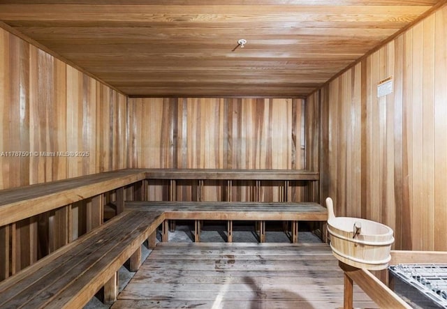 2950 NE 188th St Unit 501, Aventura, FL 33180 - relaxing sauna with wooden ceiling, wooden walls, and hardwood / wood-style floors