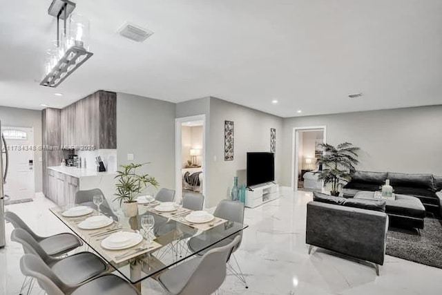 1321 S 16th Ave, Hollywood, FL 33020 - dining space featuring light marble finish flooring and recessed lighting