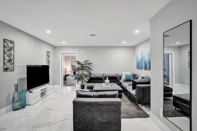 1321 S 16th Ave, Hollywood, FL 33020 - living area featuring recessed lighting, marble tiled floors, and baseboards