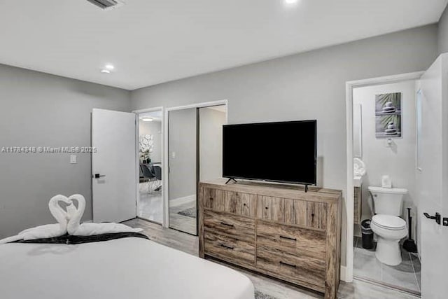 1321 S 16th Ave, Hollywood, FL 33020 - bedroom featuring a closet, ensuite bath, and recessed lighting