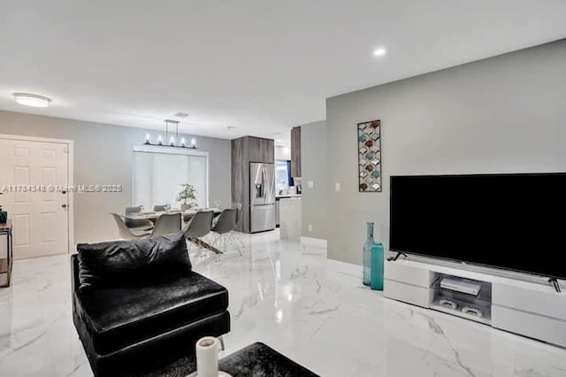 1321 S 16th Ave, Hollywood, FL 33020 - living room featuring light marble finish flooring, a chandelier, baseboards, and recessed lighting