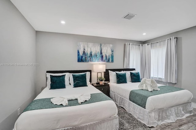1321 S 16th Ave, Hollywood, FL 33020 - bedroom with recessed lighting, wood finished floors, and baseboards