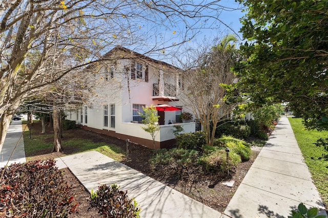 view of property exterior with stucco siding