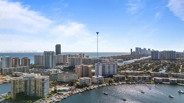 property's view of city featuring a water view