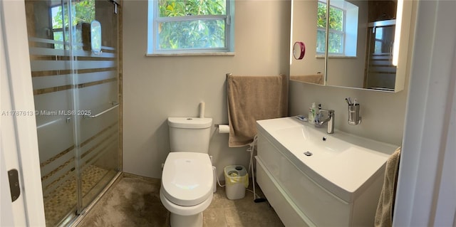 full bathroom featuring vanity, toilet, and a stall shower