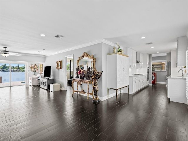4231 NE 16th Ave, Oakland Park, FL 33334 - living room featuring recessed lighting, a ceiling fan, baseboards, dark wood finished floors, and crown molding