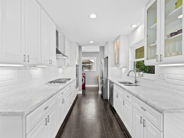 4231 NE 16th Ave, Oakland Park, FL 33334 - kitchen featuring a sink, stainless steel appliances, baseboards, recessed lighting, and wall chimney range hood