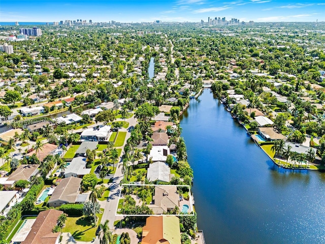 4231 NE 16th Ave, Oakland Park, FL 33334 - aerial perspective of suburban area with skyline and a nearby body of water