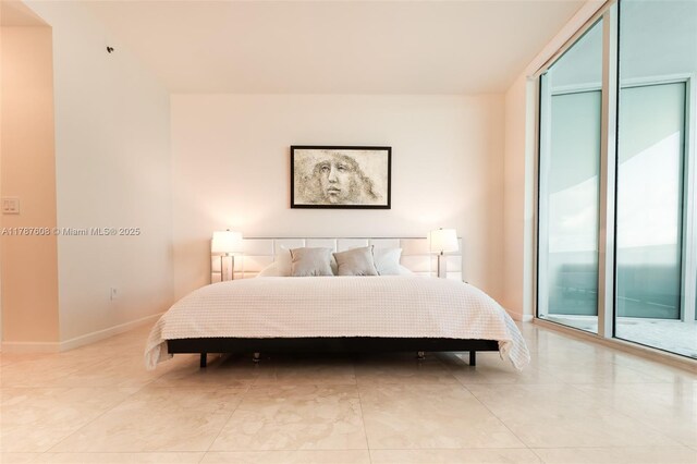 15901 Collins Ave Unit 2502, Sunny Isles Beach, FL 33160 - bedroom featuring baseboards, access to outside, and a closet