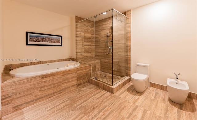 15901 Collins Ave Unit 2502, Sunny Isles Beach, FL 33160 - full bath with toilet, a garden tub, a bidet, and a stall shower