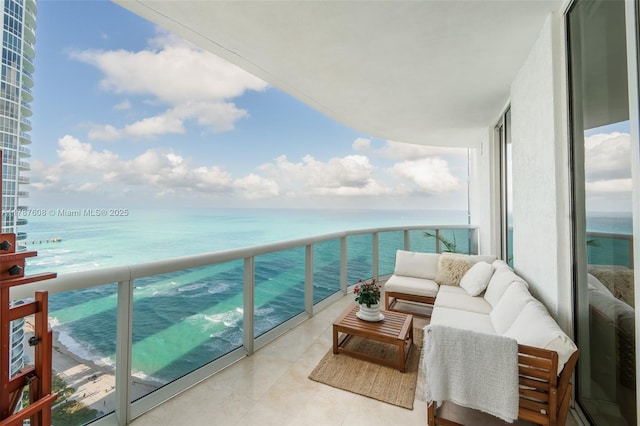 15901 Collins Ave Unit 2502, Sunny Isles Beach, FL 33160 - balcony with an outdoor hangout area and a water view