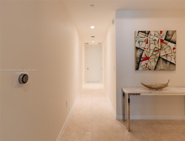 15901 Collins Ave Unit 2502, Sunny Isles Beach, FL 33160 - hallway featuring recessed lighting, baseboards, and light tile patterned floors