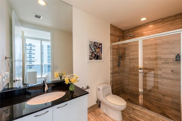 15901 Collins Ave Unit 2502, Sunny Isles Beach, FL 33160 - full bathroom with a shower stall, visible vents, toilet, and vanity