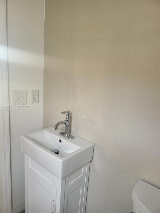 4295 NW 32nd Ave, Miami, FL 33142 - half bathroom featuring vanity and toilet