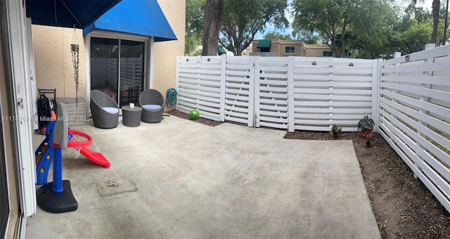 view of patio / terrace with fence