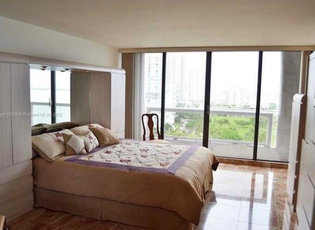 1717 N Bayshore Dr Unit A-1734, Miami, FL 33132 - tiled bedroom featuring access to exterior