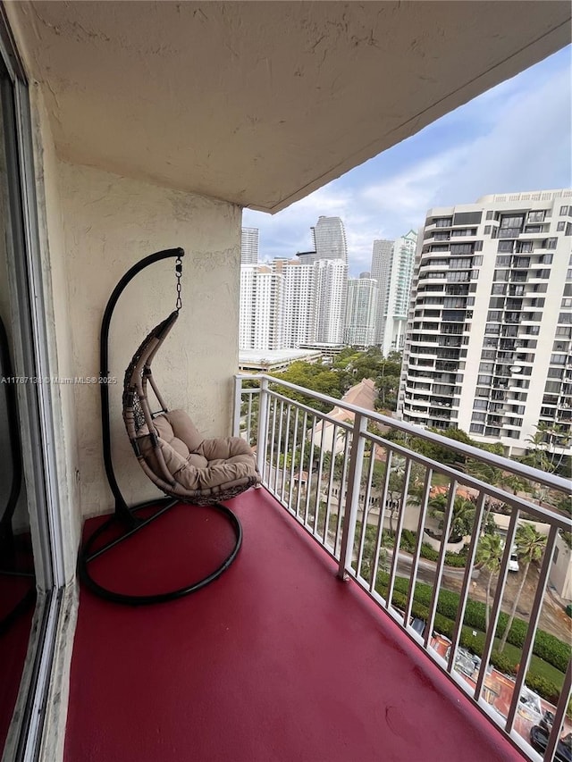 balcony featuring a city view