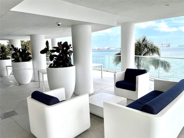 building lobby featuring a water view