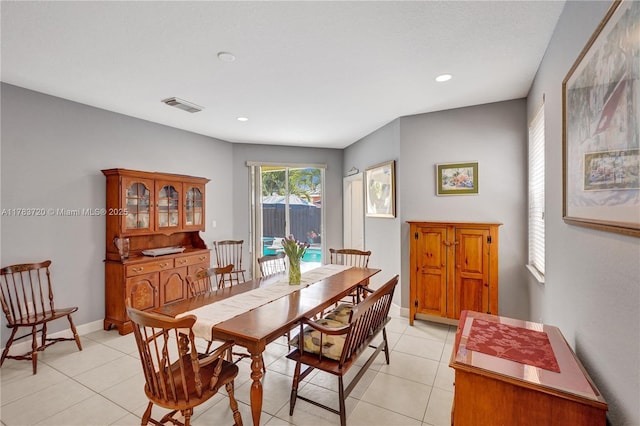 dining space featuring recessed lighting, visible vents, and light tile patterned floors