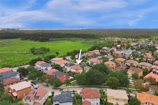 bird's eye view with a view of trees and a residential view