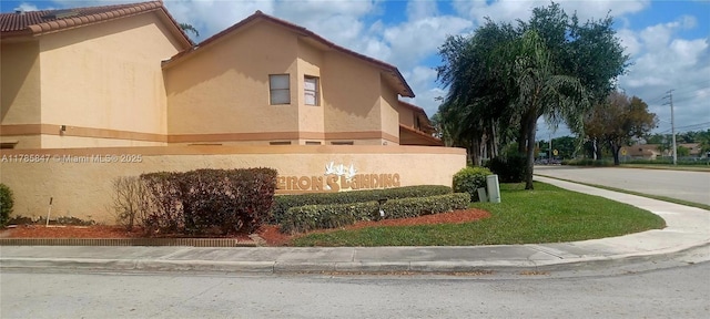 view of property exterior with stucco siding