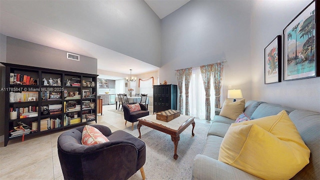 11282 SW 9th Ct, Pembroke Pines, FL 33025 - living room featuring a chandelier, high vaulted ceiling, and light tile patterned flooring