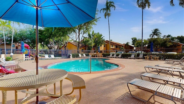 11282 SW 9th Ct, Pembroke Pines, FL 33025 - community pool featuring fence and a patio area