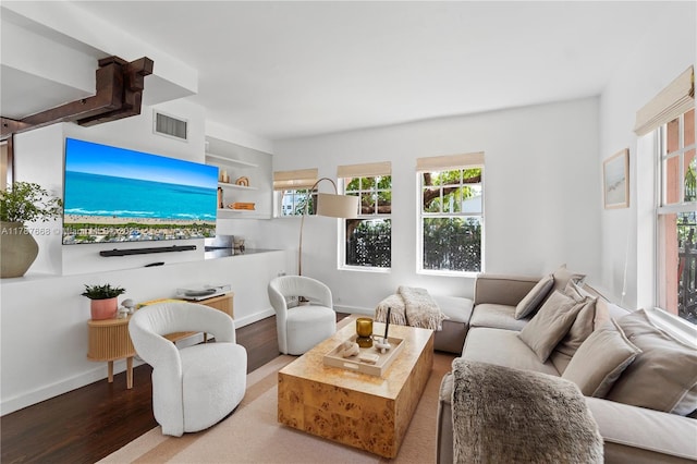 760 Meridian Ave Unit 1, Miami Beach, FL 33139 - living area featuring baseboards, wood finished floors, and visible vents
