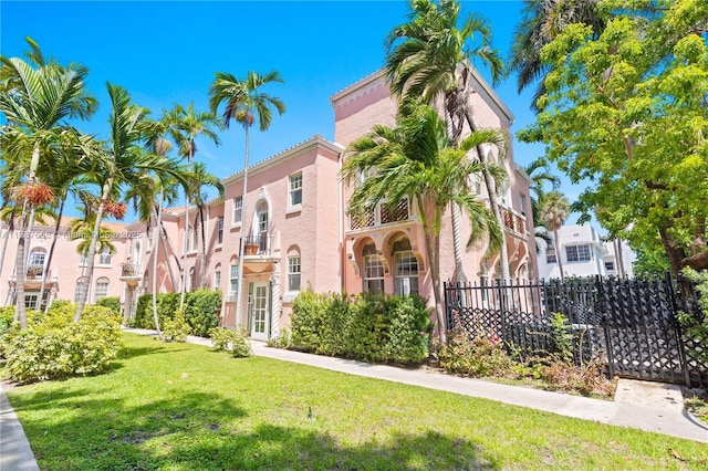 760 Meridian Ave Unit 1, Miami Beach, FL 33139 - view of building exterior with fence