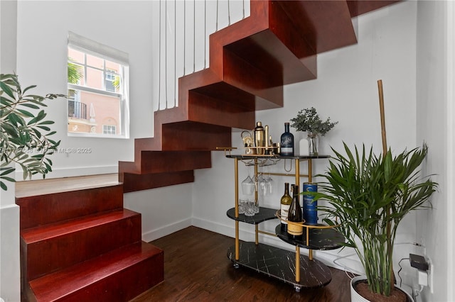 760 Meridian Ave Unit 1, Miami Beach, FL 33139 - stairway featuring baseboards and wood finished floors