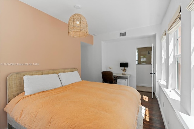 760 Meridian Ave Unit 1, Miami Beach, FL 33139 - bedroom with dark wood-style flooring and visible vents