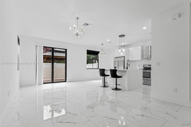 4814 NW 56th Ct, Tamarac, FL 33319 - unfurnished living room with baseboards, recessed lighting, light marble finish floors, and a sink