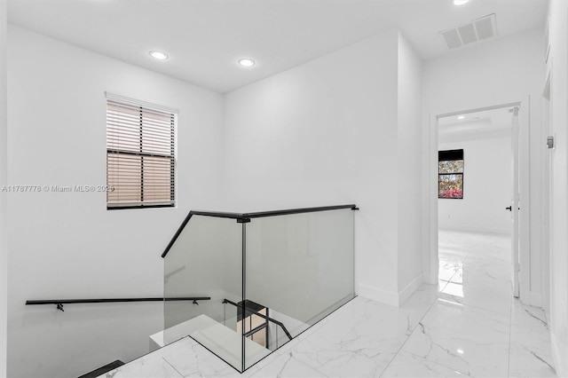 4814 NW 56th Ct, Tamarac, FL 33319 - staircase featuring recessed lighting, marble tiled floors, plenty of natural light, and baseboards