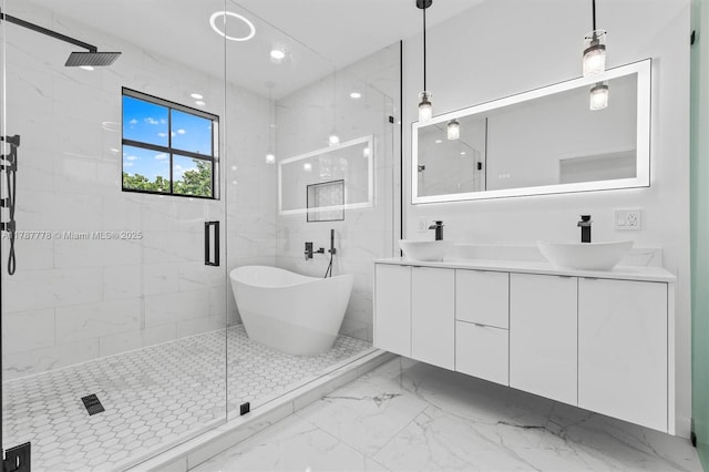 4814 NW 56th Ct, Tamarac, FL 33319 - bathroom featuring a shower stall, marble finish floors, double vanity, a freestanding tub, and recessed lighting