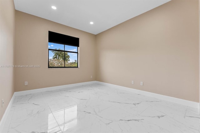 4814 NW 56th Ct, Tamarac, FL 33319 - unfurnished room with light marble finish floors, baseboards, and recessed lighting