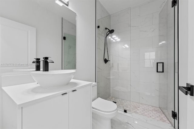 4814 NW 56th Ct, Tamarac, FL 33319 - full bath featuring a stall shower, vanity, marble finish floors, and toilet