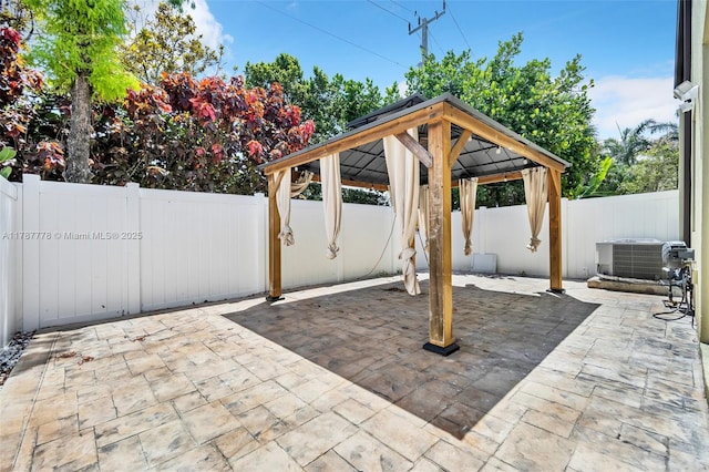 4814 NW 56th Ct, Tamarac, FL 33319 - fenced backyard featuring a patio area and a gazebo