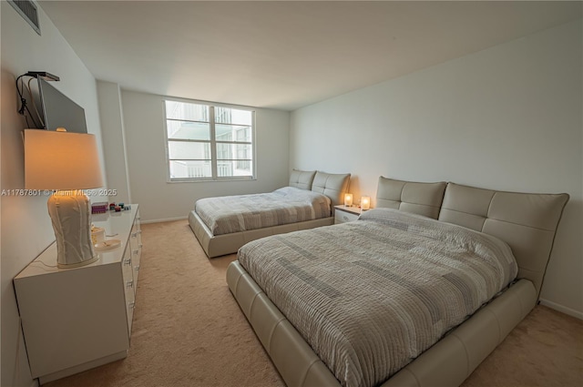 301 174th St Unit 1917, Sunny Isles Beach, FL 33160 - bedroom featuring light colored carpet, visible vents, and baseboards