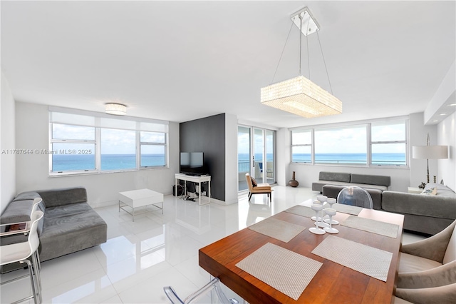 3180 S Ocean Dr Unit 1608, Hallandale Beach, FL 33009 - tiled dining space featuring a wealth of natural light and baseboards