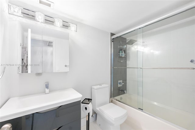 3180 S Ocean Dr Unit 1608, Hallandale Beach, FL 33009 - bathroom with vanity, toilet, bath / shower combo with glass door, and visible vents