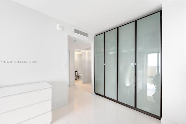 3180 S Ocean Dr Unit 1608, Hallandale Beach, FL 33009 - interior space with light tile patterned flooring, visible vents, and baseboards