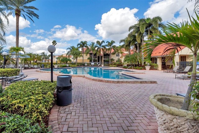 1245 SW 46th Ave Unit 1210, Pompano Beach, FL 33069 - community pool featuring a patio