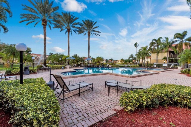 1245 SW 46th Ave Unit 1210, Pompano Beach, FL 33069 - community pool featuring a patio
