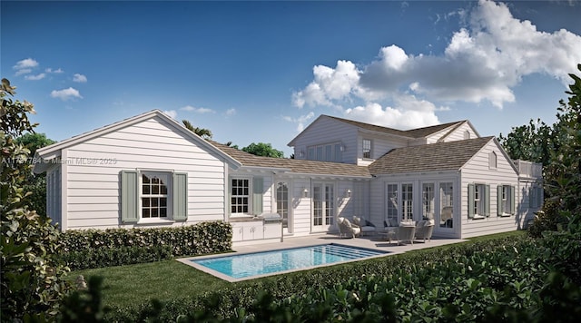 3609 Washington Rd, West Palm Beach, FL 33405 - back of property with an outdoor pool, a patio, and a yard