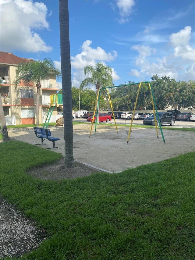 community play area featuring a yard