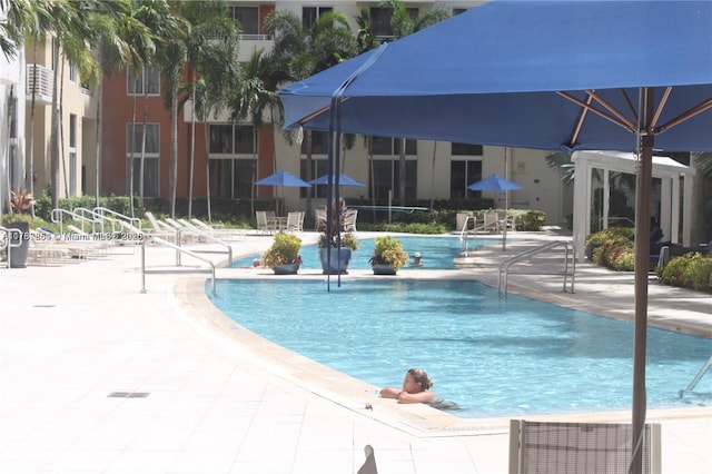 18800 NE 29th Ave Unit 1028, Aventura, FL 33180 - community pool with a patio area