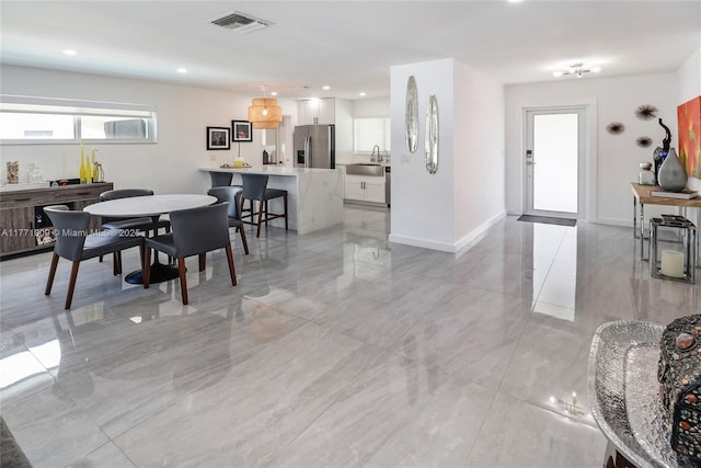1990 NE 35th St, Lighthouse Point, FL 33064 - dining space with baseboards, visible vents, and recessed lighting