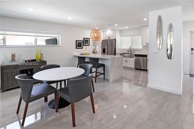 1990 NE 35th St, Lighthouse Point, FL 33064 - dining area with marble finish floor and recessed lighting