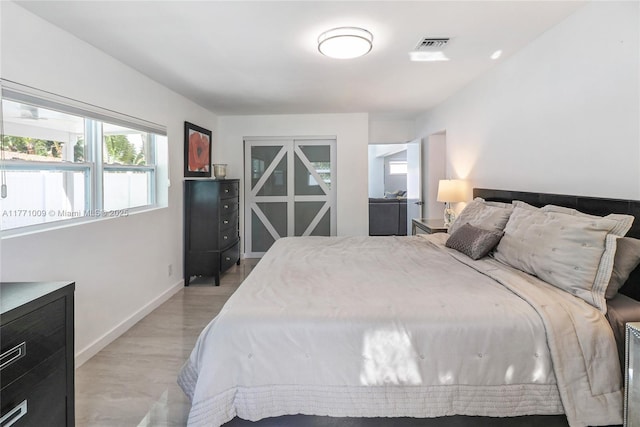 1990 NE 35th St, Lighthouse Point, FL 33064 - bedroom featuring baseboards and visible vents
